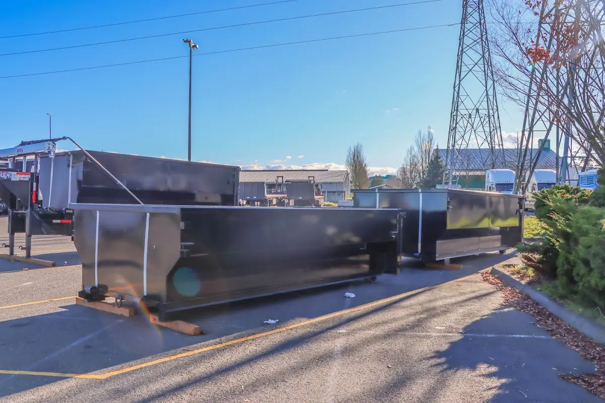 Roll-off dumpster ready for waste disposal at job site for 3 Yard Dumpster Rental in Uniontown